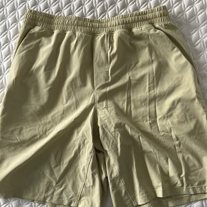 Men’s Lululemon pacebreaker shorts. Never worn